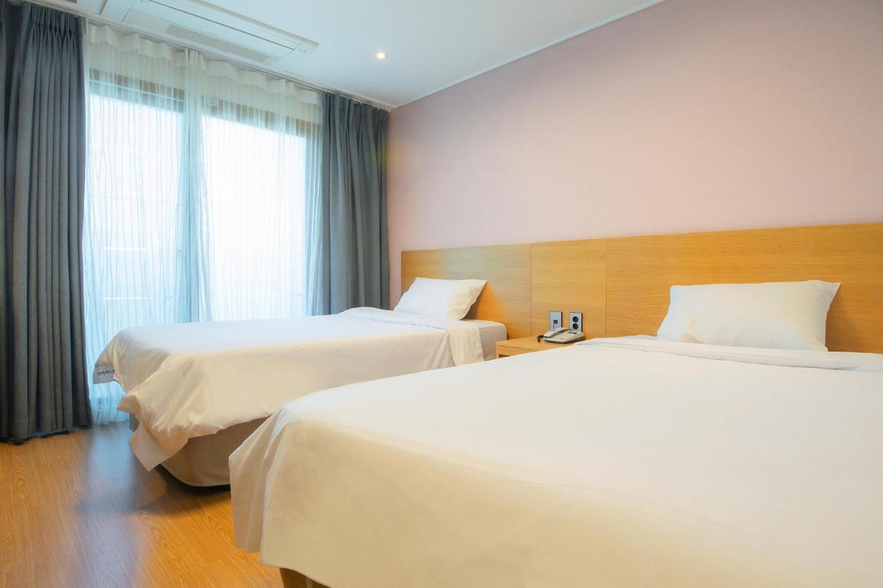 Sims Hotel Чеджудо Экстерьер фото