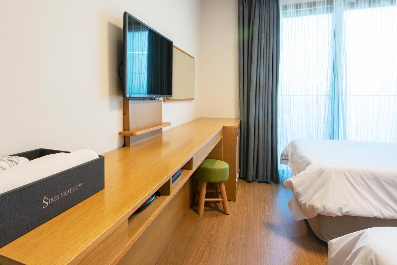 Sims Hotel Чеджудо Экстерьер фото