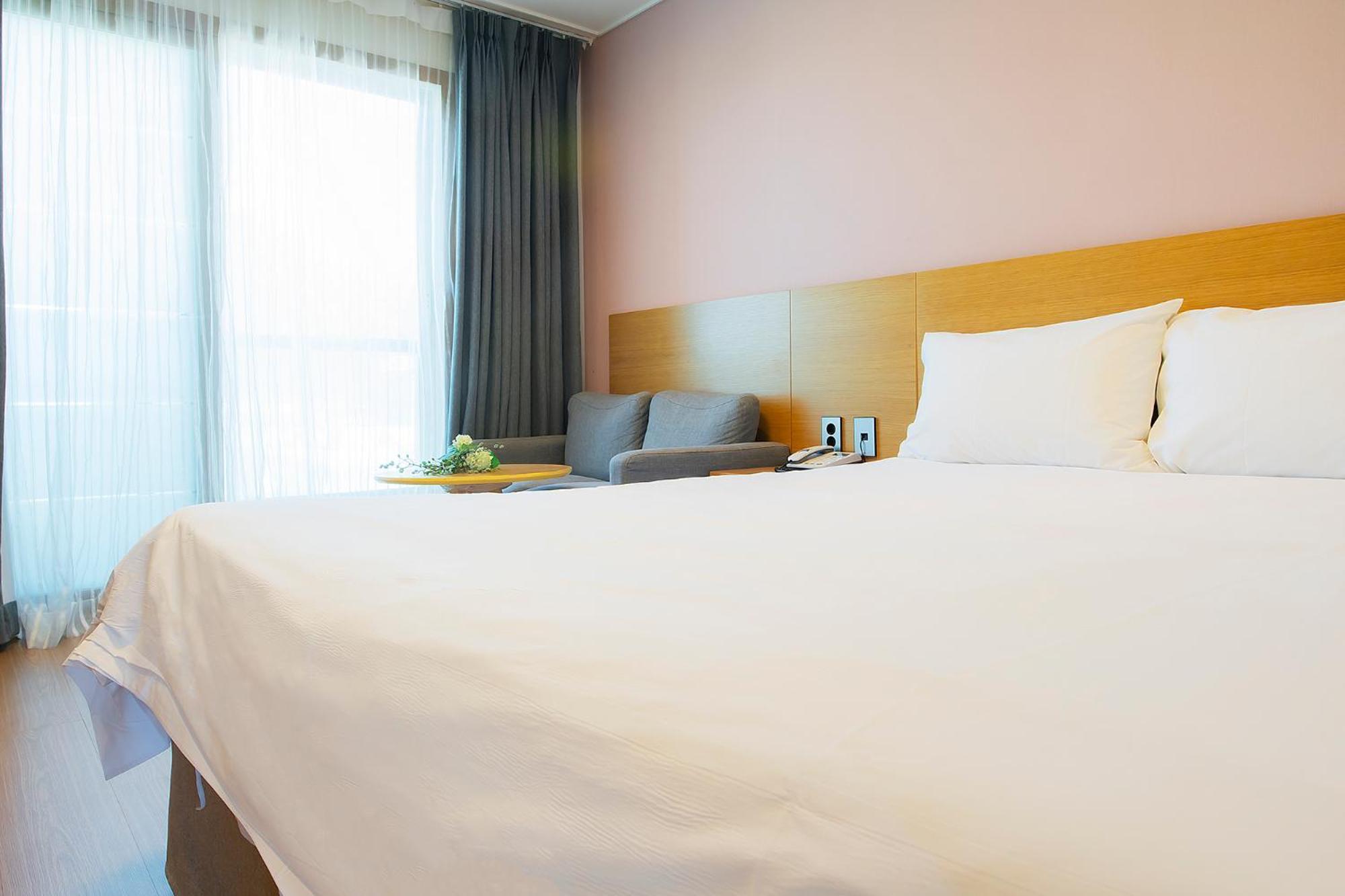 Sims Hotel Чеджудо Экстерьер фото